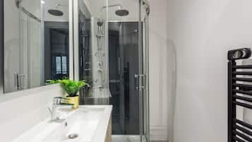 Apartment, City View | Bathroom | Shower, rainfall showerhead, eco-friendly toiletries, hair dryer