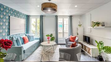 Appartement, vue ville | Coin séjour | TV connectée, Netflix, services de streaming, espaces bureaux