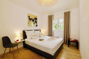 Fer et planche à repasser, lit parapluie, Wi-Fi, draps fournis