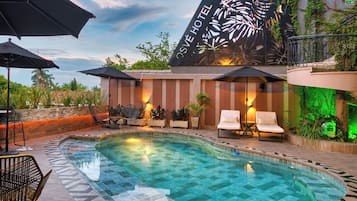 Outdoor pool, open 10:00 AM to 8:00 PM, pool umbrellas, pool loungers