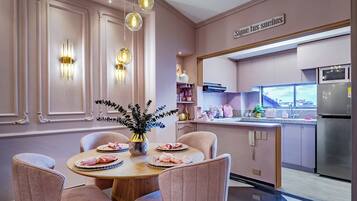 Design Apartment, City View | Private kitchen | Coffee/tea maker, griddle, cleaning supplies