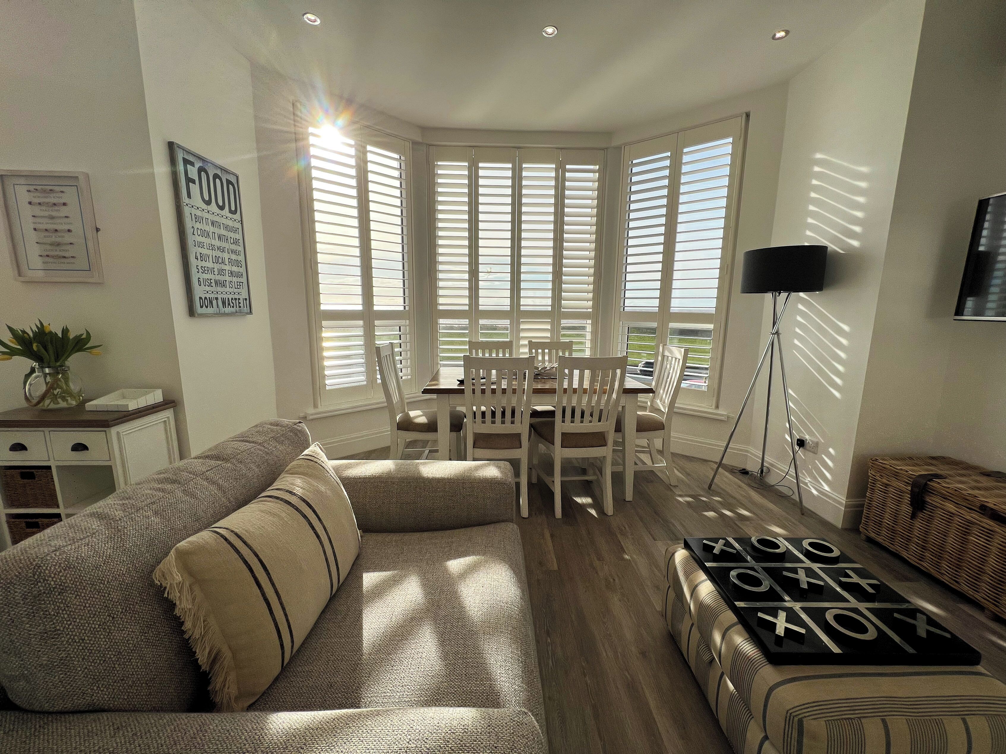 Family Apartment, Balcony, Sea View | Living area | 40-inch Smart TV with digital channels, Netflix, streaming services