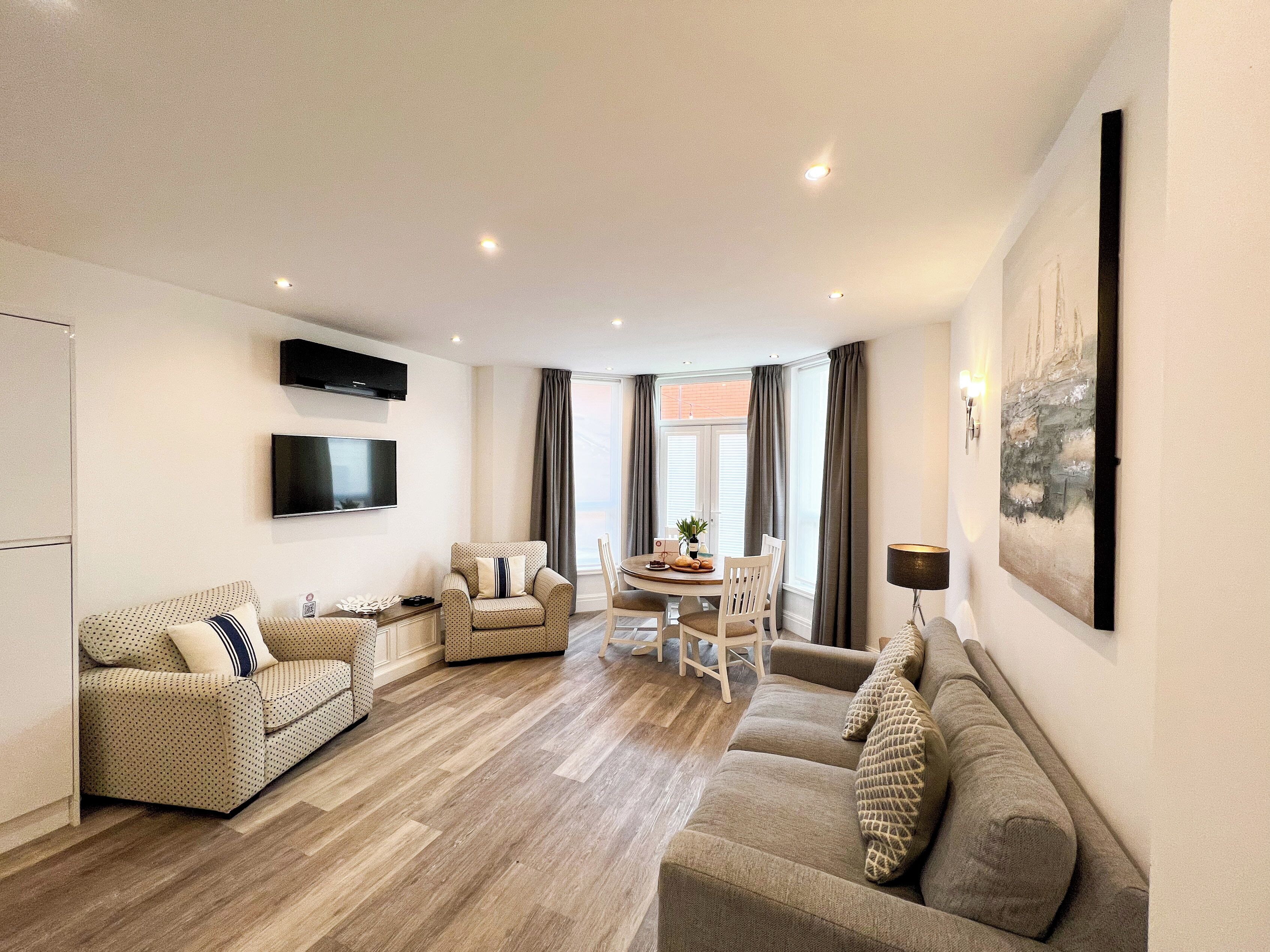 Deluxe Apartment, Patio, Garden View | Living area | 40-inch Smart TV with digital channels, Netflix, streaming services