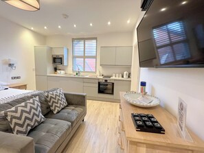 Family Studio Suite, Garden View | Private kitchen | Espresso maker, electric kettle