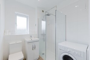 Shower, hair dryer, towels