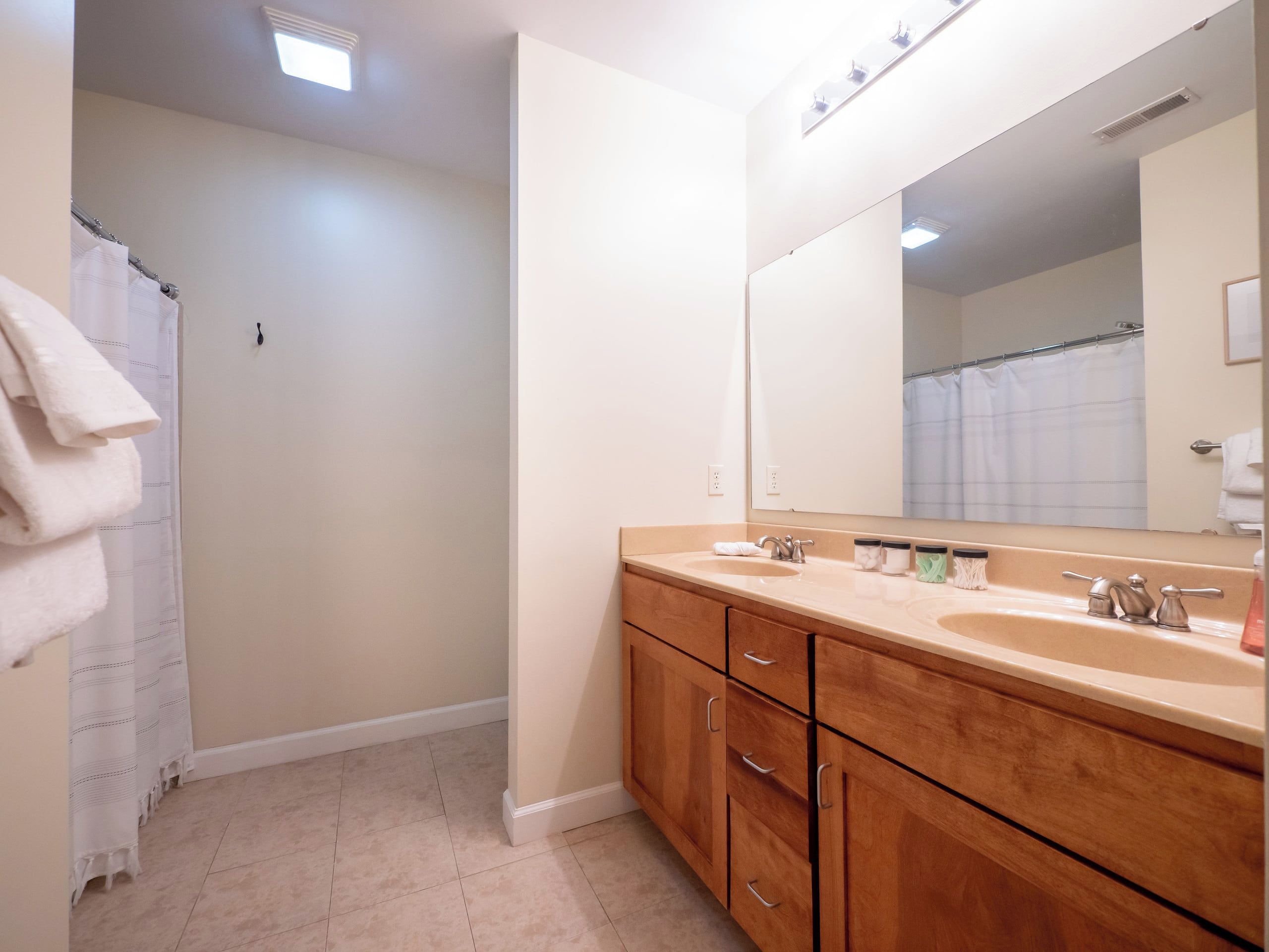 One of two full bathrooms
