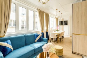 Apartment, Courtyard View | Living area | 43-inch Smart TV with cable channels, Netflix, streaming services - Merveil-Luxury Suite -MaraisPoissonniere (Paris)