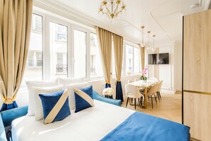 Apartment, Courtyard View | Living area | 43-inch Smart TV with cable channels, Netflix, streaming services - Merveil-Luxury Suite -MaraisPoissonniere (Paris)