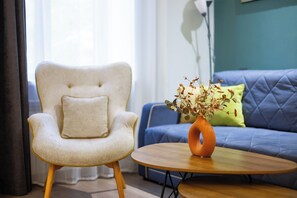 Comfort-Apartment | Wohnbereich | 50-Zoll-Flachbildfernseher mit Kabelempfang