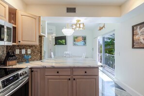Fridge, microwave, oven, stovetop - Sunset Reef 2bed/2bath updated single family with private pool & dockage (Marathon)