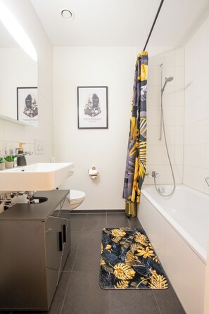 Hair dryer, towels, soap, shampoo