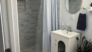 Shower, towels, toilet paper