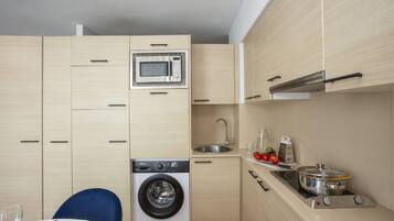 Microones, placa de cuina i rentaplats