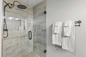Shower, hair dryer, towels