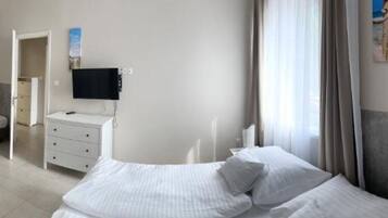 2 bedrooms, iron/ironing board, WiFi, bed sheets