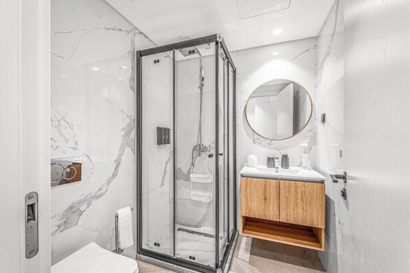 Hair dryer, towels, soap, toilet paper