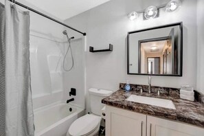 Hair dryer, towels, soap, shampoo