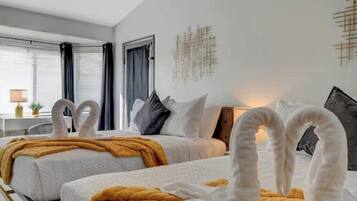 4 bedrooms, desk, iron/ironing board, travel cot