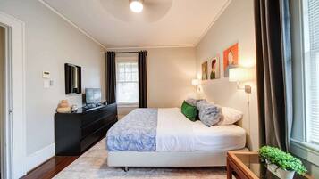 1 bedroom, desk, iron/ironing board, travel crib