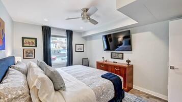 1 bedroom, desk, iron/ironing board, travel crib