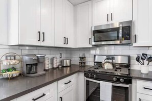 Fridge, microwave, oven, stovetop - Extravagant 4BD Home w/ Hot Tub & Pool Table (North Las Vegas)