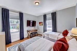 4 bedrooms, desk, iron/ironing board, travel cot