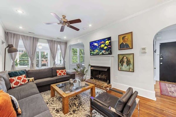 Bright, open living space with natural light, Smart TV, and free Wi-Fi just minutes from Uptown Charlotte.