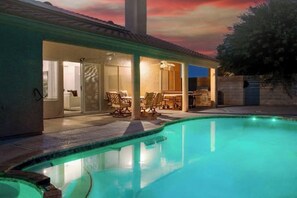 Outdoor pool, a heated pool - Stellar 5 BD Home w/Games & Pool! (North Las Vegas)