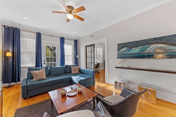 A welcoming living room designed for comfort, whether you're relaxing or catching up on work.