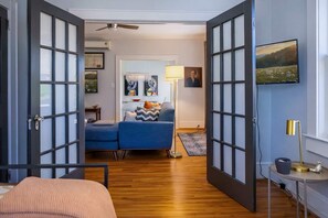 TV, offices - The Home Collection: Historic 2BR Ground Floor Condo Steps to Latta Park (Charlotte)