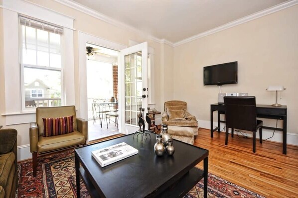 TV, offices - Chic Historic Dilworth Condo · King Bed · Porch (Charlotte)