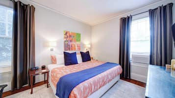 1 bedroom, desk, iron/ironing board, travel crib