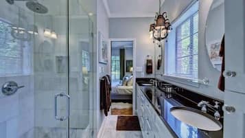 Shower, hair dryer, towels, shampoo