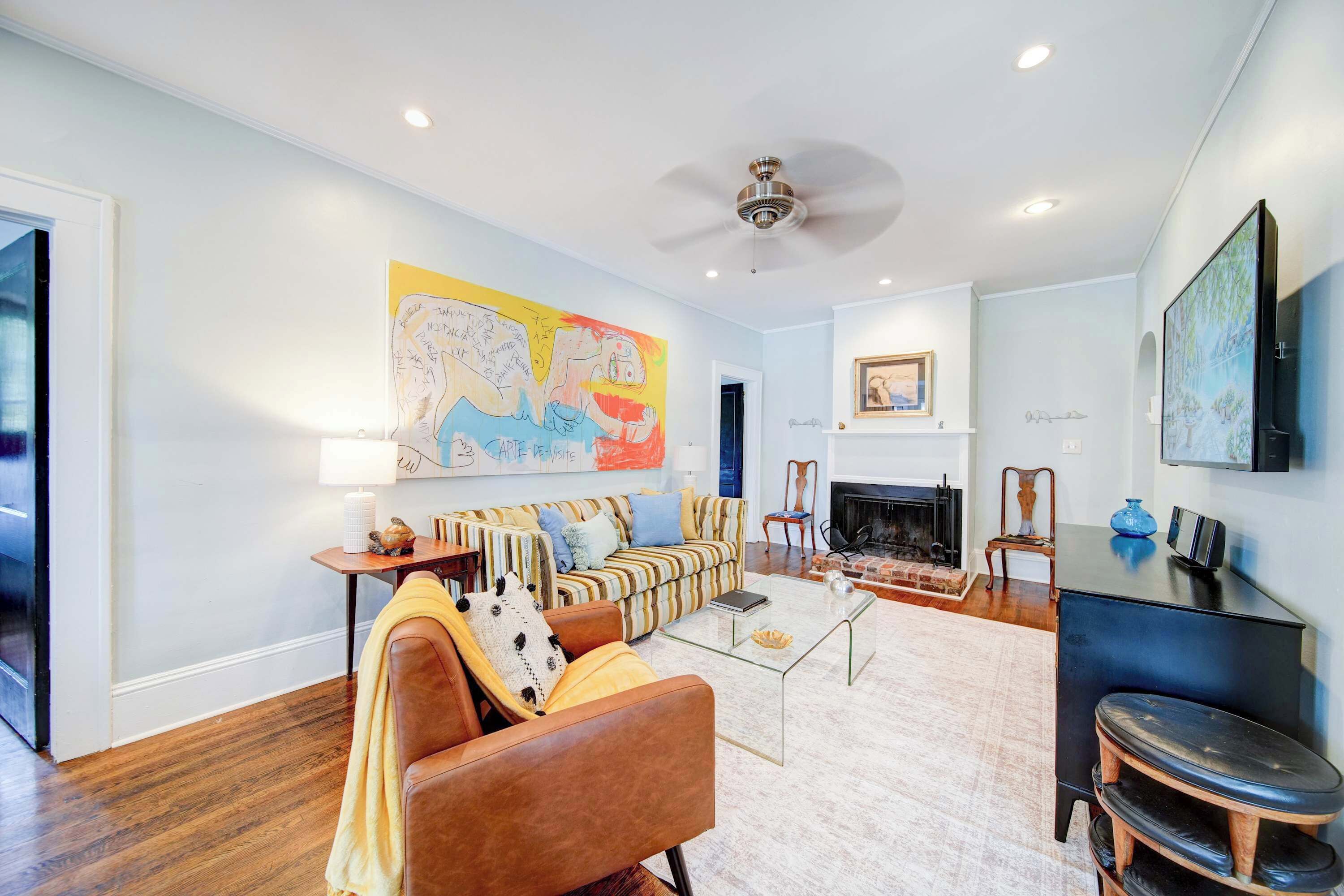 Bright, open living space with natural light, Smart TV, and free Wi-Fi just minutes from Uptown Charlotte.