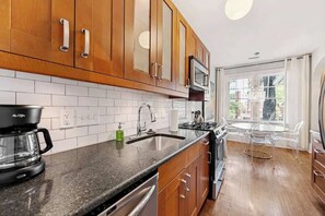 Fridge, microwave, oven, stovetop - Refined Myers Park 2BR King Condo | Sunroom (Charlotte)