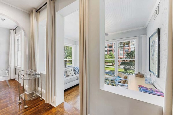 TV, fireplace, offices - Refined Myers Park 2BR King Condo | Sunroom (Charlotte)