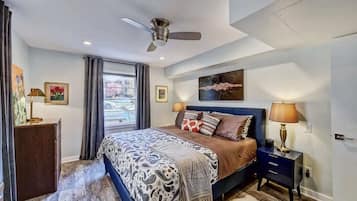 1 bedroom, desk, iron/ironing board, travel crib