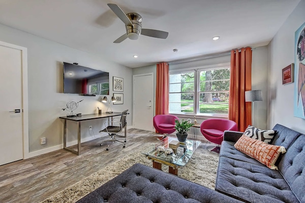 Relax in this sun-drenched living space featuring a large Smart TV and free Wi-Fi for all your needs.