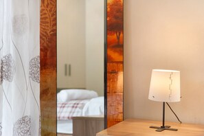 2 habitaciones, tabla de planchar con plancha, wifi y ropa de cama