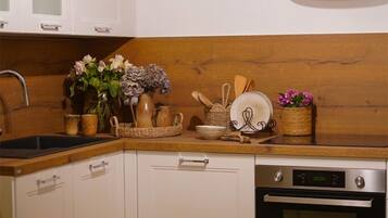 Cottage Supérieur, vue fleuve | Cuisine privée