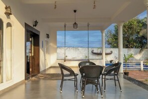 Outdoor dining - Truliv Villa Cabana–Luxury 4BHK Seaview/ Pool, ECR (Chennai)