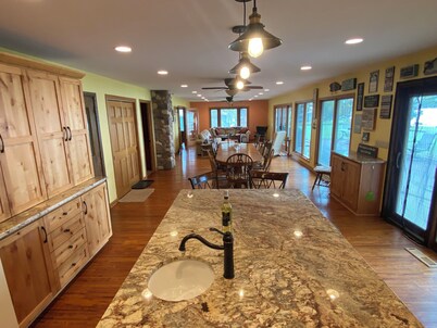 Beautiful Lake Home on 1 acre of frontage. Year around recreation & relaxation!