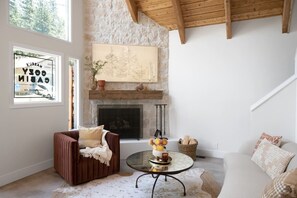 TV, fireplace, books, offices