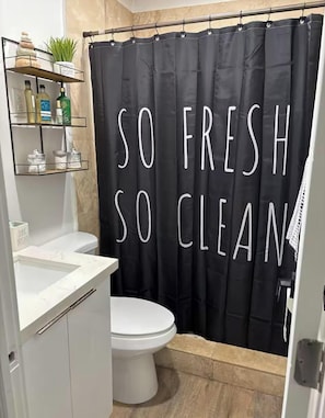 Shower, hair dryer, towels, soap