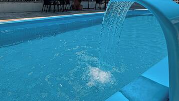 Piscina interna, guarda-sóis