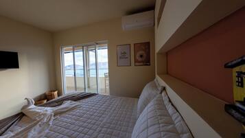 Deluxe Suite, Beach View | Laptop workspace, free WiFi