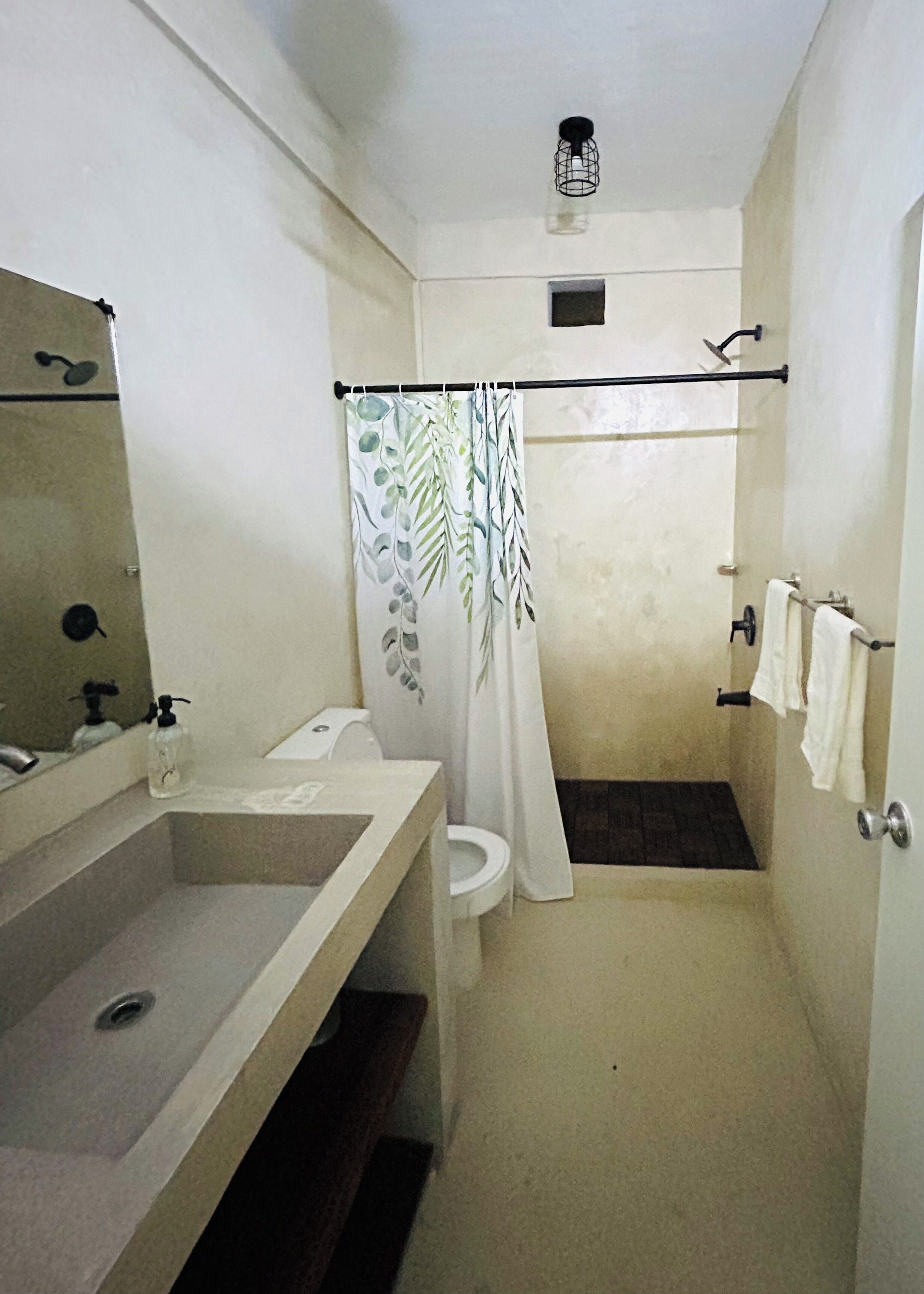 Shower, towels, soap, toilet paper