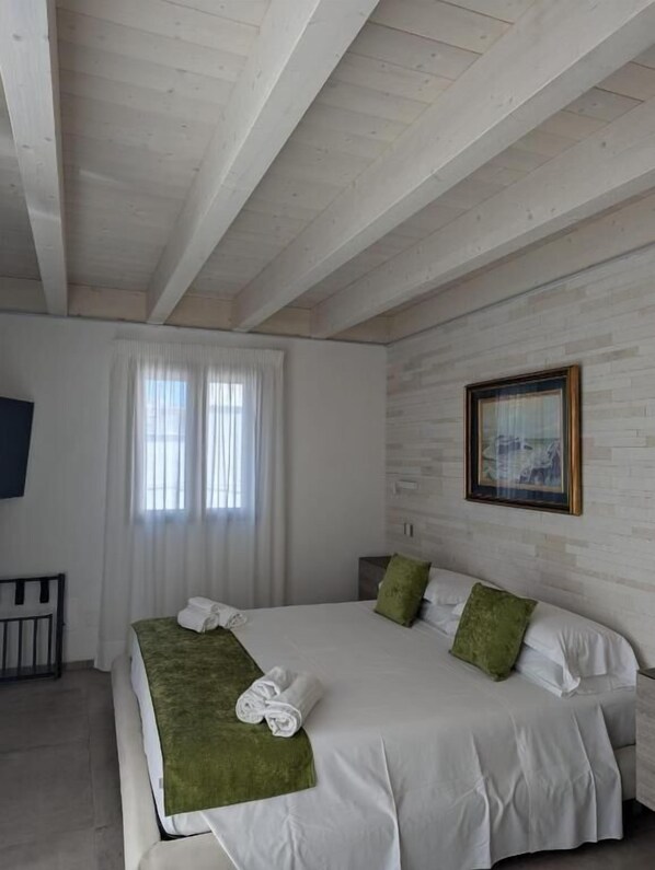 Suite Deluxe, vistes al mar | Wifi gratuïta i habitacions accessibles amb cadira de rodes