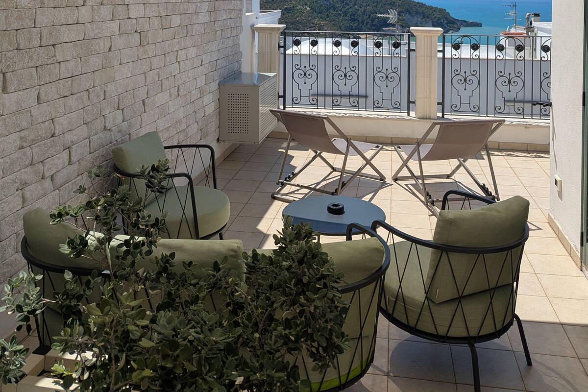Deluxe kamer, 1 twee- of 2 eenpersoonsbedden, uitzicht op zee | Terras