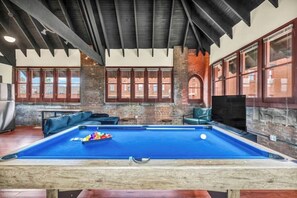 Game room - Urban Industrial Penthouse | Game Room Pool Table (Cleveland)